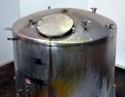 Used Tank, 1650 Gallon, 316 Stainless Steel, Vertical. Approximate 84” diameter x 60” straight side, dished top and bottom. Openings top 2” tri-clamp, (4) 3” tri-clamp, 2-1/2” tri-clamp, 23” man way ...