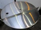 Used Tank, 1000 Gallon, 304 Stainless Steel, Vertical. Approximate 61” diameter x 81” straight side, flat top with a bolt on cover with a 1/3 hinged opening, sloped bottom. Side bottom entering agita...