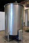 Used Tank, 1000 Gallon, 304 Stainless Steel, Vertical. Approximate 61” diameter x 81” straight side, flat top with a bolt on cover with a 1/3 hinged opening, sloped bottom. Side bottom entering agita...