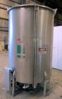 Used Tank, 1000 Gallon, 304 Stainless Steel, Vertical. Approximate 61” diameter x 81” straight side, flat top with a bolt on cover with a 1/3 hinged opening, sloped bottom. Side bottom entering agita...
