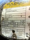 Used Tank, 1000 Gallon, 304 Stainless Steel, Vertical. Approximate 61” diameter x 81” straight side, flat top with a bolt on cover with a 1/3 hinged opening, sloped bottom. Side bottom entering agita...