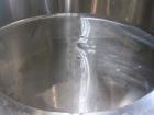 Used Tank, 2225 Gallon, 304 Stainless Steel, Vertical. Approximate 79” diameter x 105” straight side, flat welded top, sloped bottom. Side bottom entering agitator, 3 blade prop driven by a 5hp, 3/60...