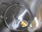 Used Tank, 2225 Gallon, 304 Stainless Steel, Vertical. Approximate 79” diameter x 105” straight side, flat welded top, sloped bottom. Side bottom entering agitator, 3 blade prop driven by a 5hp, 3/60...