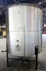 Used Tank, 1100 Gallon, 304 Stainless Steel, Vertical. Approximately 68” diameter x 70” straight side, flat top with (2) 1/3 hinged covers, coned bottom. Fixed stainless steel agitator bridge. Approx...