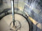 Used Tank, 1100 Gallon, 304 Stainless Steel, Vertical. Approximately 68” diameter x 70” straight side, flat top with (2) 1/3 hinged covers, coned bottom. Fixed stainless steel agitator bridge. Approx...