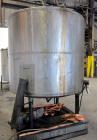 Used Tank, 1100 Gallon, 304 Stainless Steel, Vertical. Approximately 72” diameter x 60” straight side, dished top and bottom. Side bottom entering agitator with a 3 blade prop, driven by a 3/4 hp, 3/...