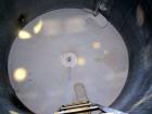 Used Tank, 1100 Gallon, 304 Stainless Steel, Vertical. Approximately 72” diameter x 60” straight side, dished top and bottom. Side bottom entering agitator with a 3 blade prop, driven by a 3/4 hp, 3/...