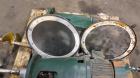Used Tank, 1050 Gallons, 304 Stainless Steel, Vertical.  Approximately 62” diameter x 82” straight side.  Flat top, sloped bottom.  Off-center top entering Lightnin agitator, model N33G-150.  1-1/2” ...