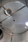 Used Vinquip Jacketed Beverage Tank,  2284 Gallon, 304 Stainless Steel, Vertical. Approximately 83” diameter x 97-1/2” straight side, off center coned top, sloped bottom.  (1) 24” Wide bottom sidewal...
