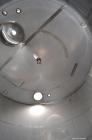 Used Vinquip Jacketed Beverage Tank,  2284 Gallon, 304 Stainless Steel, Vertical. Approximately 83” diameter x 97-1/2” straight side, off center coned top, sloped bottom. (1) 24” Wide bottom sidewall...