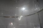 Used Vinquip Jacketed Beverage Tank,  2284 Gallon, 304 Stainless Steel, Vertical. Approximately 83” diameter x 97-1/2” straight side, off center coned top, sloped bottom. (1) 24” Wide bottom sidewall...