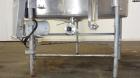 Used- Tank, 1000 Gallon, 304 Stainless Steel, Vertical. 60” Diameter x 82” straight side, flat welded top, sloped bottom. Si...