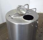 Used Tank, 1000 Gallon, 304 Stainless Steel, Vertical. 60” Diameter x 82” straight side, flat welded top, sloped bottom. Side Bottom entering agitator with a 3 blade prop, driven by a 3hp, 3/60/230/4...