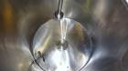 Used Tank, 1000 Gallon, 304 Stainless Steel, Vertical. 60” Diameter x 82” straight side, flat welded top, sloped bottom. Side Bottom entering agitator with a 3 blade prop, driven by a 3hp, 3/60/230/4...