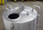 Used Tank, 1000 Gallon, 304 Stainless Steel, Vertical. 60” Diameter x 82” straight side, flat welded top, sloped bottom. Side Bottom entering agitator with a 3 blade prop, driven by a 2hp, 3/60/208-2...