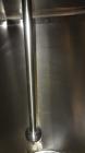 Used Tank, 1000 Gallon, 304 Stainless Steel, Vertical. 60” Diameter x 82” straight side, flat welded top, sloped bottom. Side Bottom entering agitator with a 3 blade prop, driven by a 2hp, 3/60/208-2...
