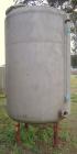 Used Tank, 1000 Gallon, stainless steel, vertical. Approximately 54