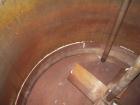 Used Tank, 1000 Gallon, stainless steel, vertical. Approximately 54