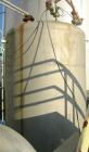 Used Tank, 1000 Gallon, stainless steel, vertical. Approximately 54