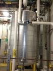Used Northland Stainless Pressure Tank, 1000 Gallon, 316L Stainless Steel, Vertical. Internal rated for 15 psi & Full Vacuum at 300 degrees F.  Welded dish heads, mounted on (4) legs. Serial # 991178...