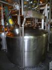 Used Norwalk Tank, 2000 Gallon,  stainless steel, vertical. 76
