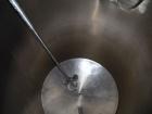 Used Norwalk Tank, 2000 Gallon,  stainless steel, vertical. 76