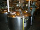 Used Norwalk Tank, 2000 Gallon,  stainless steel, vertical. 76
