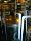 Used Norwalk Tank, 2000 Gallon,  stainless steel, vertical. 76