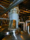 Used Norwalk Tank, 2000 Gallon,  stainless steel, vertical. 76