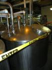 Used Norwalk Tank, 2000 Gallon,  stainless steel, vertical. 76