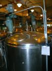 Used Norwalk Tank, 2000 Gallon,  stainless steel, vertical. 76
