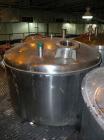 Used Norwalk Tank, 2000 Gallon, stainless steel, vertical. 76