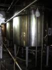 Used Norwalk Tank, 2000 Gallon,  stainless steel, vertical. 76