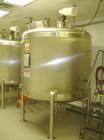 Used Mueller Agitated Tank, 1000 Gallon, Model F. 6' diameter x 4' straight side, dish top and bottom, off center 1 hp Lightnin agitator drive with mechanical seal, 230/460 volt, 3 blade turbine agit...
