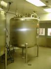 Used Mueller Agitated Tank, 1000 Gallon, Model F. 6' diameter x 4' straight side, dish top and bottom, off center 1 hp Lightnin agitator drive with mechanical seal, 230/460 volt, 3 blade turbine agit...