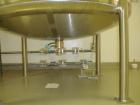 Used Mueller Agitated Tank, 1000 Gallon, Model F. 6' diameter x 4' straight side, dish top and bottom, off center 1 hp Lightnin agitator drive with mechanical seal, 230/460 volt, 3 blade turbine agit...