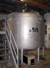Used Mueller tank, 2200 gallon, stainless steel, vertical. Approximately 96