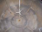 Used Mueller tank, 2200 gallon, stainless steel, vertical. Approximately 96