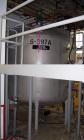 Used Mueller tank, 2200 gallon, stainless steel, vertical. Approximately 96