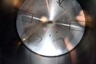 Used Perma-San Tank, 2000 Gallon, Model CVC, 316 Stainless Steel Vertical. 84” Diameter x 80” straight side. Dished top, coned bottom. Off center top entering Lightnin air operated agitator, model XJ...