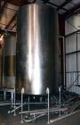 Used Perma-San Tank, 3000 Gallon, Model CVC, Stainless Steel, Vertical. Approximate 80” diameter x 142” straight side. Flat top, dished bottom. Top man way, 2-1/2” threaded center bottom outlet. Moun...
