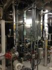 Used Stainless Steel 4,300 Gallon Insulated Storage Tank. 304 stainless steel construction, manufactured by Precision Stainless, Inc. Measures 10' diameter x 8' high, dished top and bottom. Vessel is...
