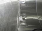 Used-Sani Tank Stainless Steel Mixing Tank, 4,000 Gallons.  Side agitated, stainless steel, side and top manways.  Slope bot...