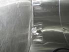 Used Sani Tank Stainless Steel Mixing Tank, 4,000 Gallons.  Side agitated, stainless steel, side and top manways.  Slope bottom with 3