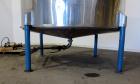 Used San-I-Tank, 2000 Gallon, 304 Stainless Steel, Vertical. 84” Diameter x 84” straight side, flat welded top, coned bottom. Lightnin clamp on agitator, model D-3. Approximate 1” diameter shaft with...