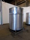Used Tank, Approximately 1,000 Gallons, 304 Stainless Steel, Vertical. Approximately 62