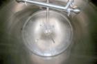 Used-St. Regis Aprox. 1,000 Gal. Single Wall Tank, Serial # 11407, Dome Top/Cone Bottom, Mounted on Stainless Steel Legs & L...