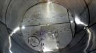 Used 5200 Gallon Stainless Steel Tri-Canada Fittings Tank