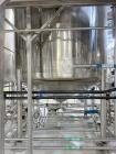 Used Sprinkman Agitated Pressure Tank,  Approximate 3,767 Gallon, Stainless Steel. Internal rated 45/FV psi at -20 to 350 degrees F. 304 stainless steel, vertical, slight dished top and cone bottom. ...