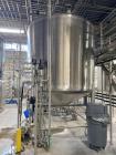 Used Sprinkman Stainless Steel Agitated Pressure Tank,  Approximate 3,767 Gallon. Internal rated 45/FV psi at -20 to 350 degrees F. 304 stainless steel, vertical, slight dished top and cone bottom.  ...
